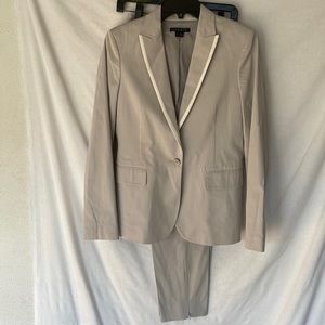 Theory Suit Lite Gray with white trim jacket, cropped pant with zipper.
